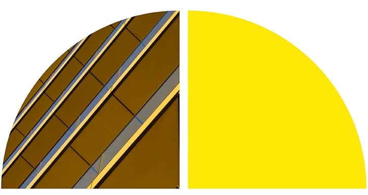 Modern building facade with diagonal lines in brown and yellow tones, next to a bright yellow semicircle on a split background. Modern building facade with diagonal lines in brown and yellow tones, next to a bright yellow semicircle on a split background.