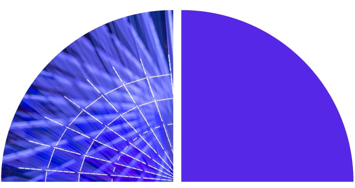 A dynamic pattern of blue and white light streaks resembling a radial web.