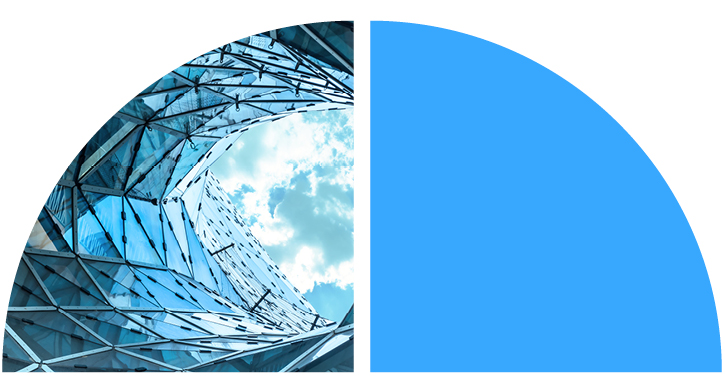A blue sky and glass building on the left, and a solid blue quarter circle on the right A blue sky and glass building on the left, and a solid blue quarter circle on the right