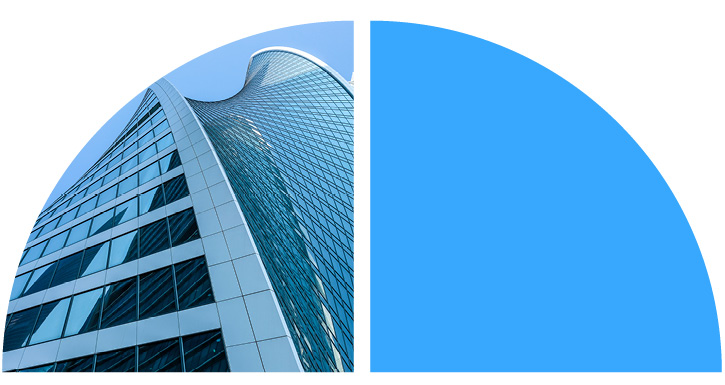 A tall building with many windows. A tall building with many windows.