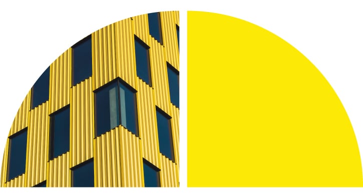 Yellow building with black windows. Yellow building with black windows.